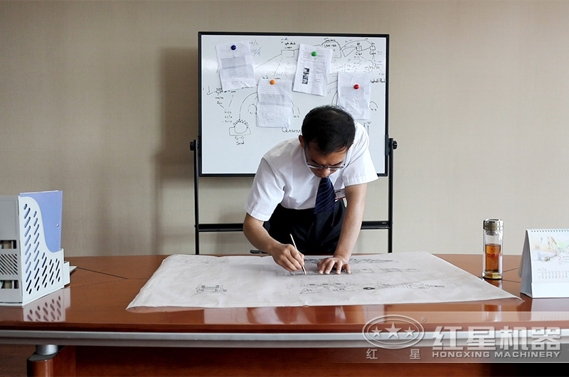 技術工程師在繪制制砂生產線流程圖中